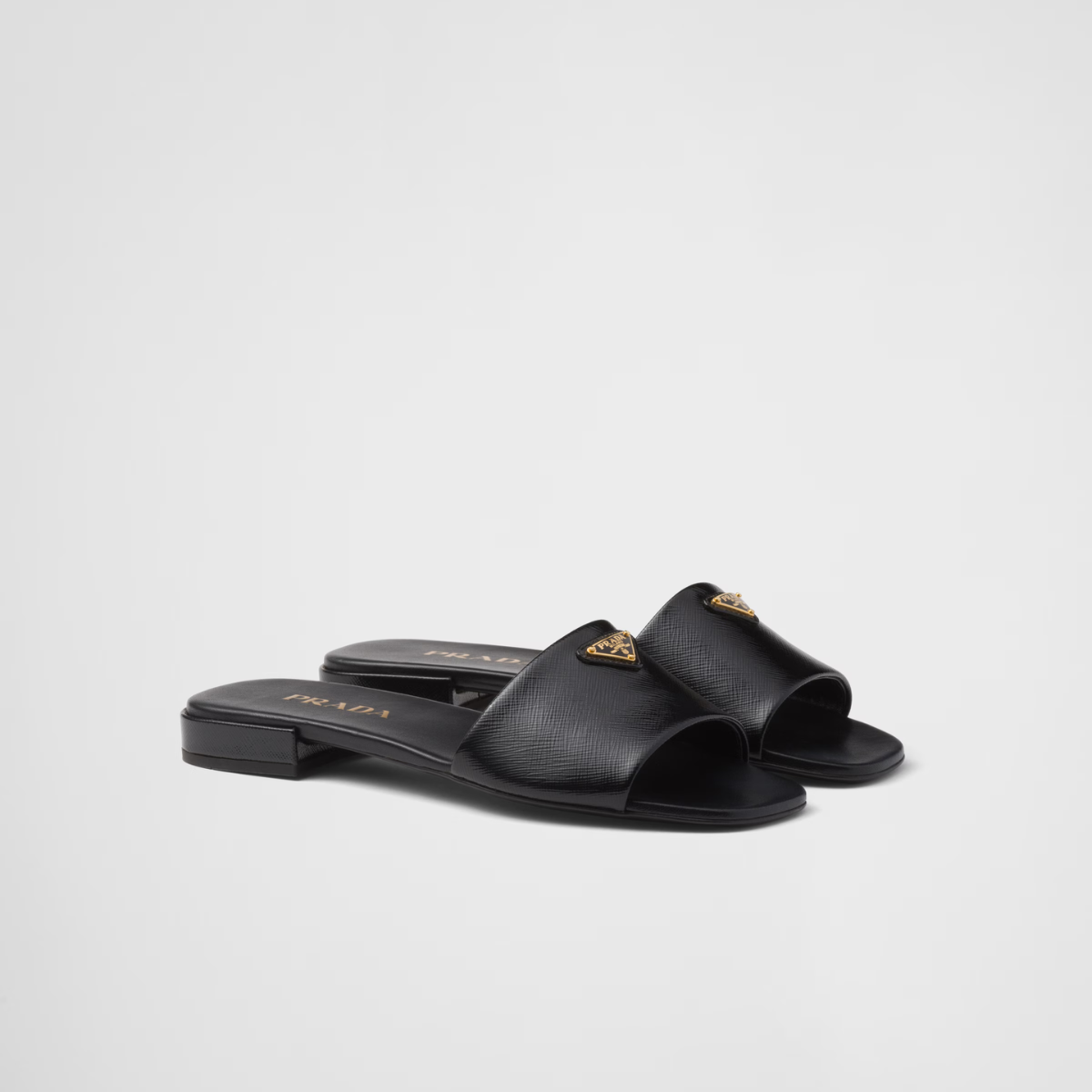 Saffiano patent leather slides – enameled metal triangle logo Leather sole with hot-stamped logo Leather-covered, – LUX VERSE Luxury Designer Fashion Outlet