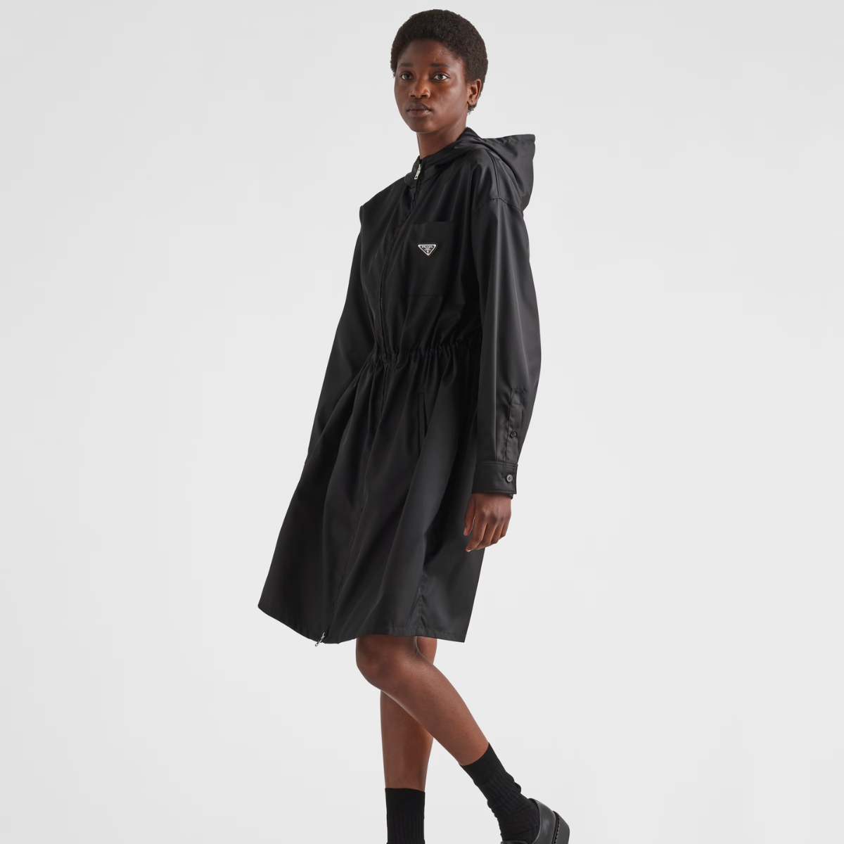 Re-Nylon Stylish Raincoat – its unique design provides protection from the rain while maintaining a fashionable – LUX VERSE Luxury Designer Fashion Outlet