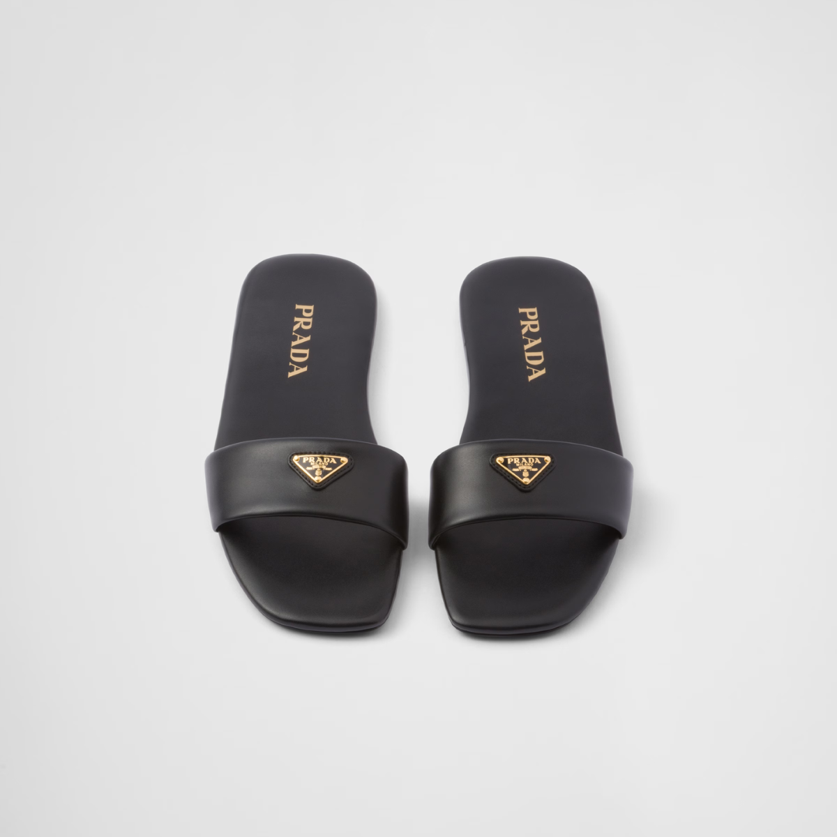 Leather slides – these flat slides with a sleek, contemporary design have a refined, versatile style – LUX VERSE Luxury Designer Fashion Outlet