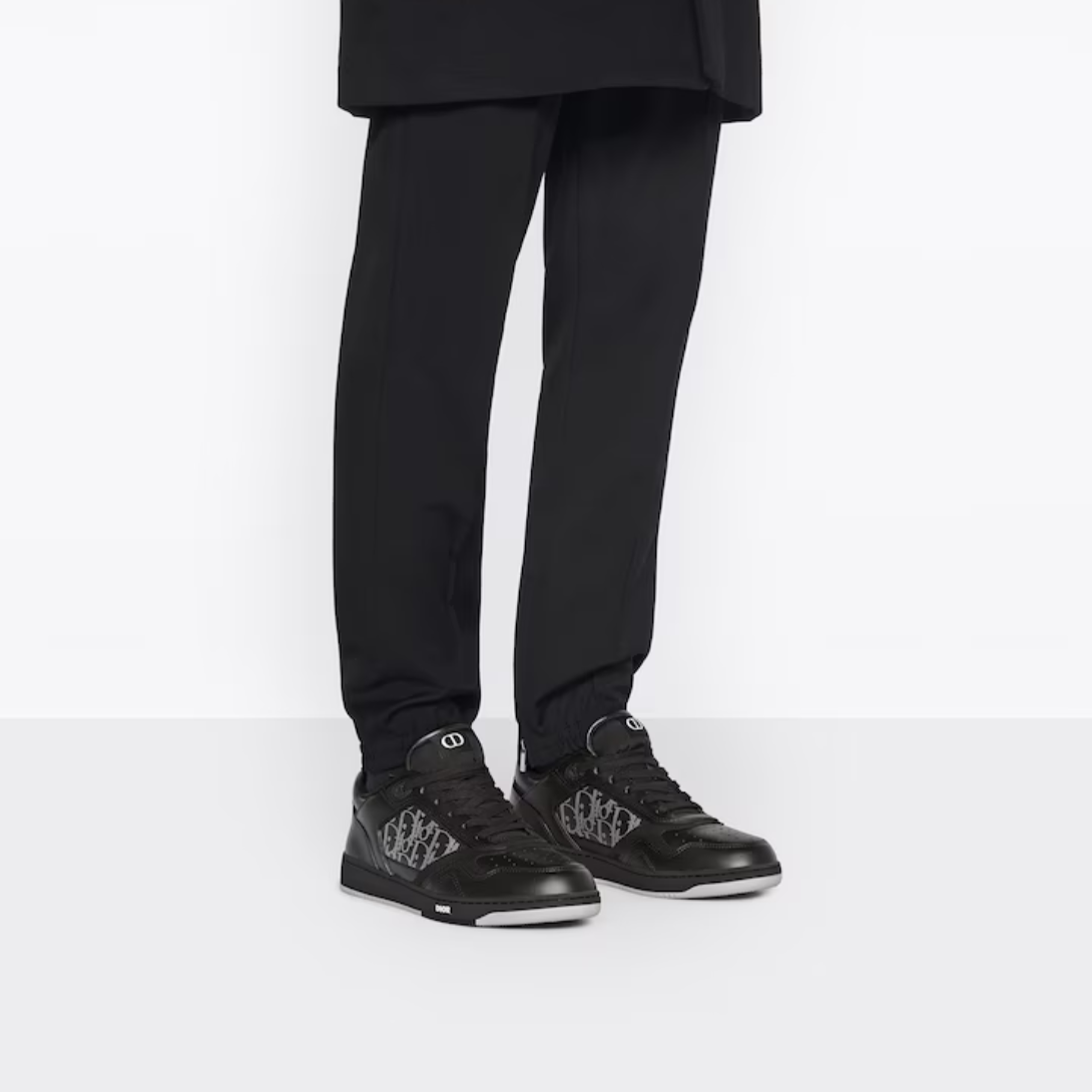 B27 Low-Top Sneaker Black – crafted in black smooth calfskin, the style is adorned with tonal suede and Oblique – LUX VERSE Luxury Designer Fashion Outlet