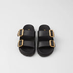 Suede strap slides – the enameled metal triangle logo embellishes the style with its sleek and iconic – LUX VERSE Luxury Designer Fashion Outlet