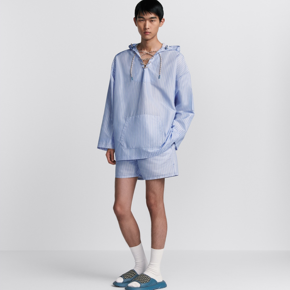 Blue Swim Shorts – featuring a stretch waist and side pocket, the swim shorts are adorned with a Italic – LUX VERSE Luxury Designer Fashion Outlet