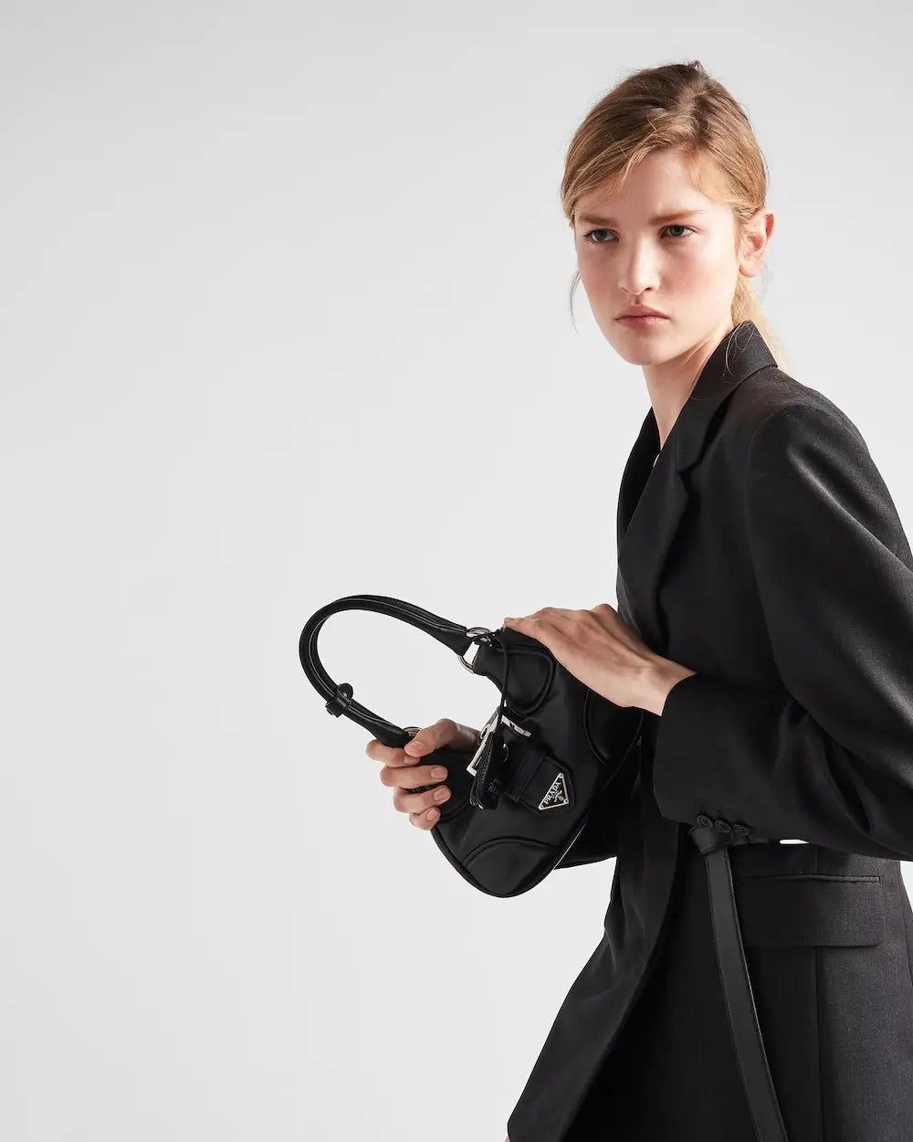 Moon Re-Nylon and leather bag – the observation of apparently distant areas leads to innovative combinations and a – LUX VERSE Luxury Designer Fashion Outlet