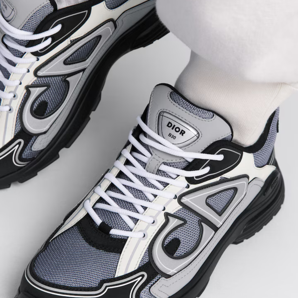 B30 Sneaker – the B30 also features silver-tone B30 and CD30 signatures on the tongue and the back – LUX VERSE Luxury Designer Fashion Outlet