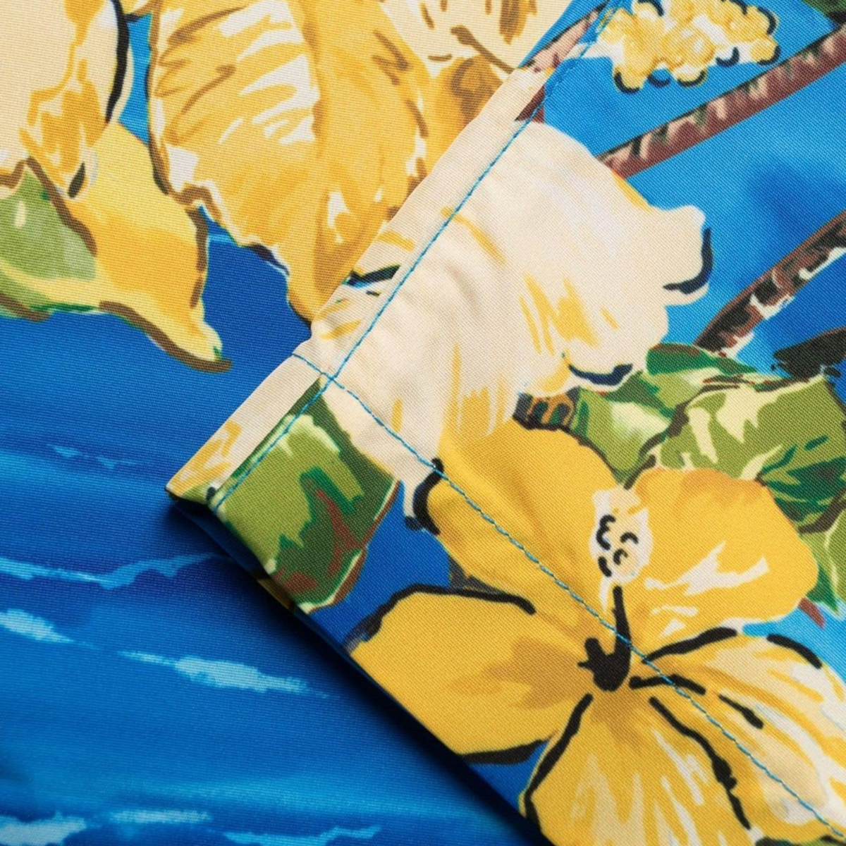 Graphic-print swim shorts – incorporates uplifting patterns into its latest edit – LUX VERSE Luxury Designer Fashion Outlet
