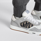 B27 Low-Top Sneaker – the sneaker is enhanced with CD Icon eyelets as well as numerous hallmark details on – LUX VERSE Luxury Designer Fashion Outlet