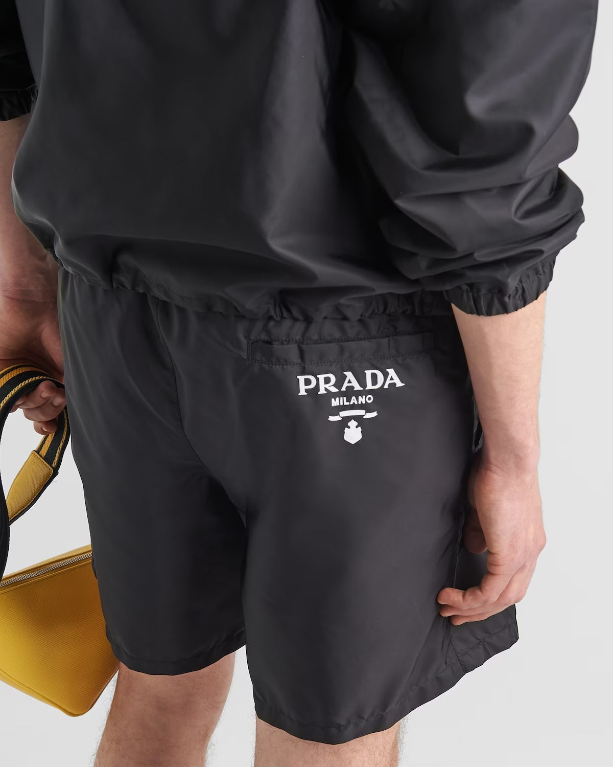 Re-Nylon swim trunks – these swim trunks with a sleek design are made of innovative Re-Nylon, a sustainable – LUX VERSE Luxury Designer Fashion Outlet