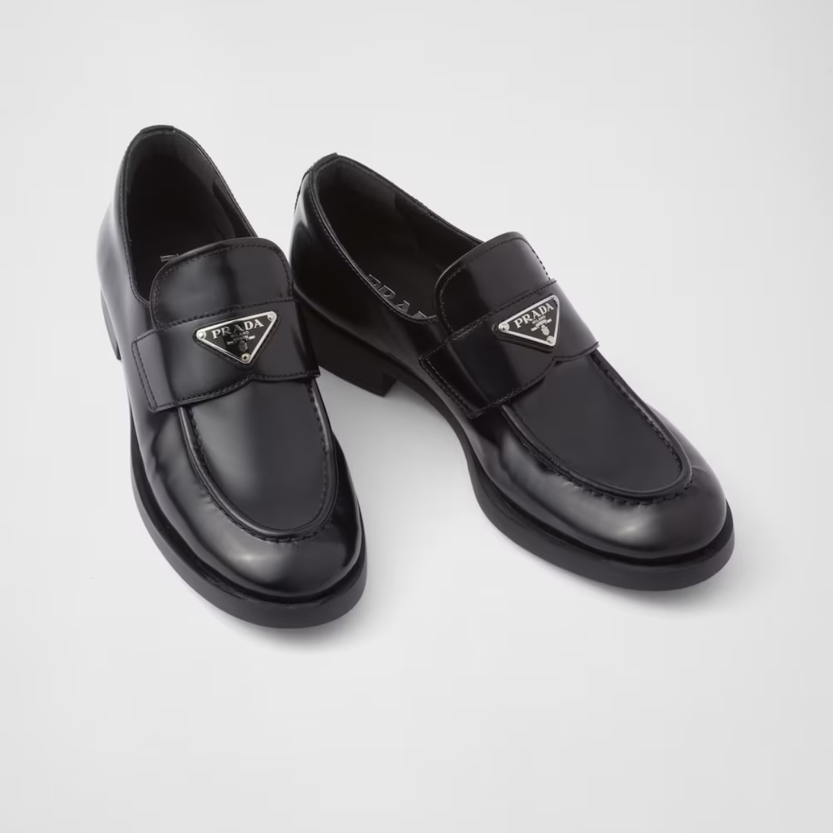 Brushed leather loafers Black – made of brushed leather, one of the brand's emblematic materials, the shoe has – LUX VERSE Luxury Designer Fashion Outlet