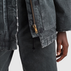 Canvas trucker jacket – this canvas trucker jacket features an oversized silhouette, emphasized by the worn – LUX VERSE Luxury Designer Fashion Outlet