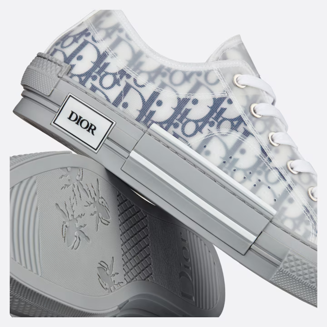 B23 Low-Top Casual Sneaker – the sneaker is further enhanced with contrasting details on the sides, including – LUX VERSE Luxury Designer Fashion Outlet