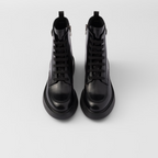 Brushed leather boots – leather lining Enameled metal triangle logo Polyester laces Boot leg: 16 cm Rubber – LUX VERSE Luxury Designer Fashion Outlet