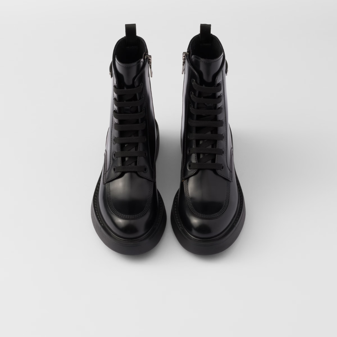 Brushed leather boots – leather lining Enameled metal triangle logo Polyester laces Boot leg: 16 cm Rubber – LUX VERSE Luxury Designer Fashion Outlet