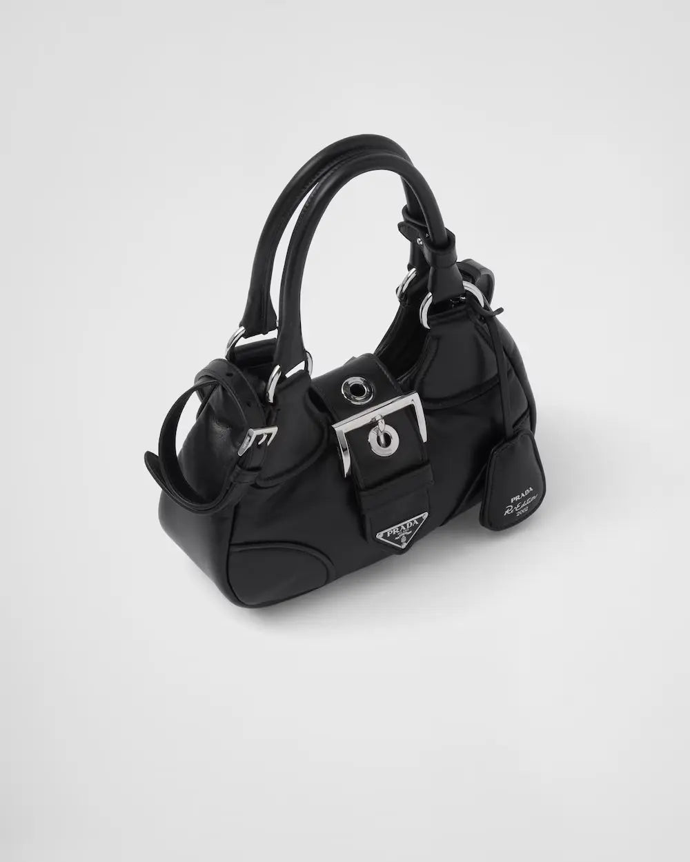 Moon Re-Nylon and leather bag – characterized by a harmonious and compact silhouette, this bag stands out for – LUX VERSE Luxury Designer Fashion Outlet