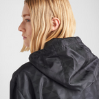 Printed Re-Nylon raincoat – iconic nylon defines the contemporary character of this oversized raincoat – LUX VERSE Luxury Designer Fashion Outlet
