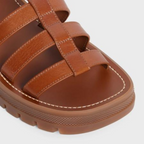 CLEA TRIOMPHE GLADIATOR SANDAL in CALFSKIN - VEGETAL TANNING – oF THE OUTSOLEDEBOSSED UNDER THE OUTSOLEADJUSTABLE BUCKLELEATHER INSOLE – LUX VERSE Luxury Designer Fashion Outlet