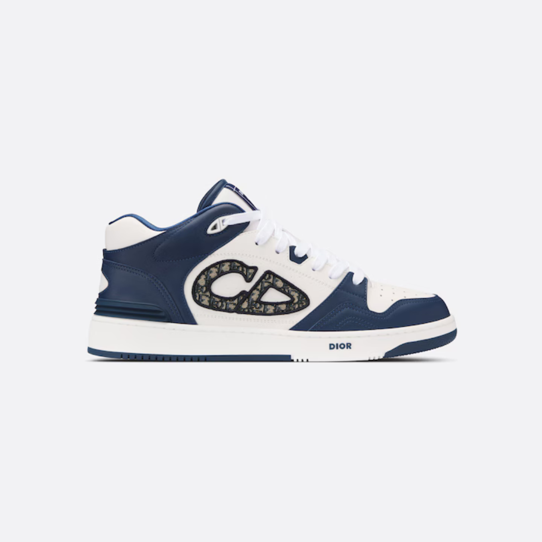 B57 Mid-Top Sneaker – new for Spring 2024, the B57 mid-top sneaker reframes the basketball shoe and is – LUX VERSE Luxury Designer Fashion Outlet