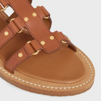 LYMPIA GLADIATOR SANDAL in CALFSKIN – 100% CALFSKIN - VEGETAL TANNING100% Calfskin LiningROUND TOE SHAPEMETAL – LUX VERSE Luxury Designer Fashion Outlet