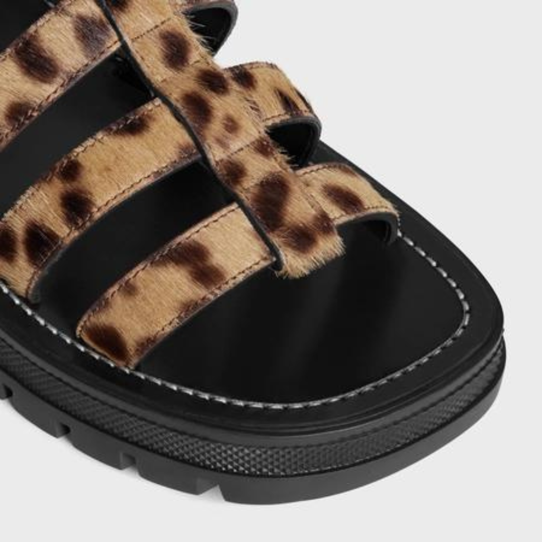 CLEA TRIOMPHE GLADIATOR SANDAL in LEOPARD PRINTED HAIRY CALFSKIN – 100% CALFSKIN100% CALFSKIN LINING1.6 IN (40 MM) heelTRIOMPHE METAL PIECEEMBOSSED – LUX VERSE Luxury Designer Fashion Outlet