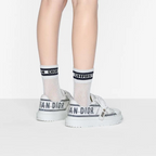 ID Sneaker – the textured-effect French blue'CHRISTIAN PARIS'signature adorns the rear – LUX VERSE Luxury Designer Fashion Outlet