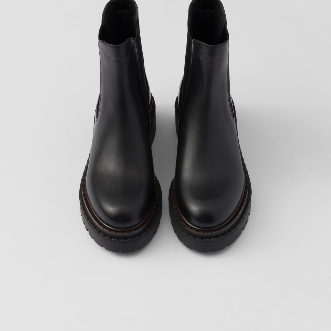 Leather Chelsea boots – upper with elasticized side gusset and pull tab Leather lining Hot-stamped logo Boot – LUX VERSE Luxury Designer Fashion Outlet
