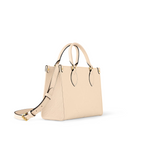 OnTheGo PM Crème Beige – a soft cream-tone makes the Monogram Empreinte leather of this OnTheGo PM bag seem – LUX VERSE Luxury Designer Fashion Outlet