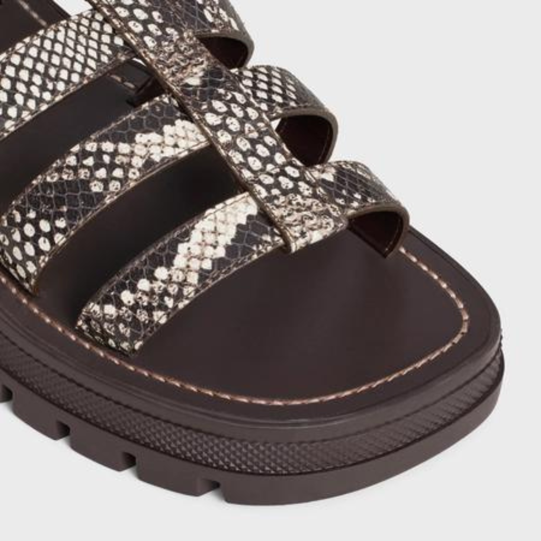 CLEA TRIOMPHE GLADIATOR SANDAL in Python Stamped Goatskin – tHE OUTSOLEADJUSTABLE BUCKLELEATHER INSOLECHUNKY LUG RUBBER OUTSOLE – LUX VERSE Luxury Designer Fashion Outlet