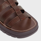 CLEA TRIOMPHE GLADIATOR SANDAL in CALFSKIN - VEGETAL TANNING – 100% CALFSKIN100% CALFSKIN LINING1.6 IN (40 MM) heelTRIOMPHE METAL PIECEEMBOSSED – LUX VERSE Luxury Designer Fashion Outlet