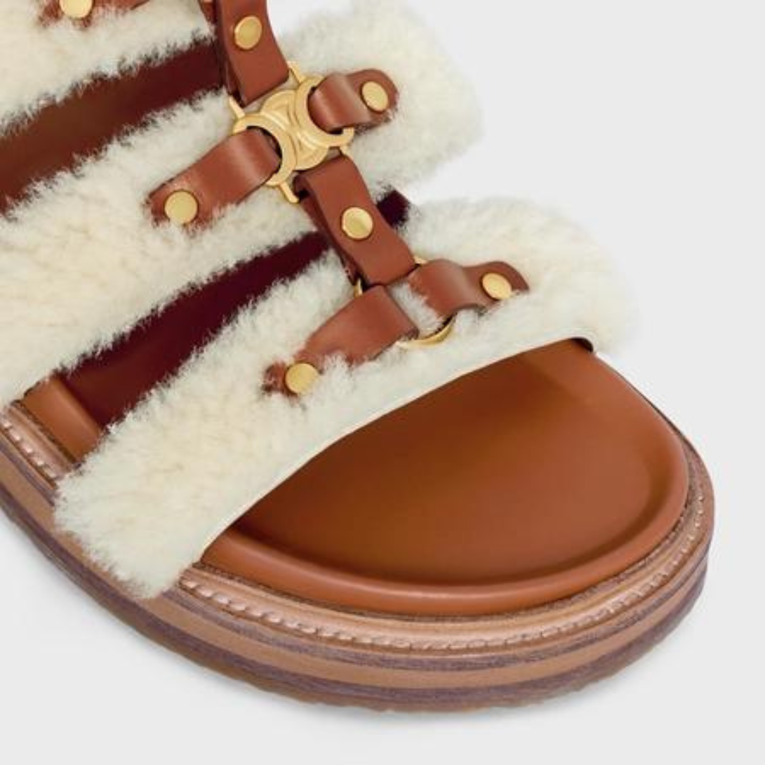TIPPI SLIDE in SHEARLING AND CALFSKIN – 50% SHEARLING 50% CALFSKIN100% CALFSKIN LINING1.2 IN (30 MM) heelSTRAPS – LUX VERSE Luxury Designer Fashion Outlet