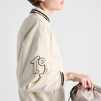 Canvas bomber jacket with patches – this oversized bomber jacket is made of canvas with a worn effect and trimmed with – LUX VERSE Luxury Designer Fashion Outlet