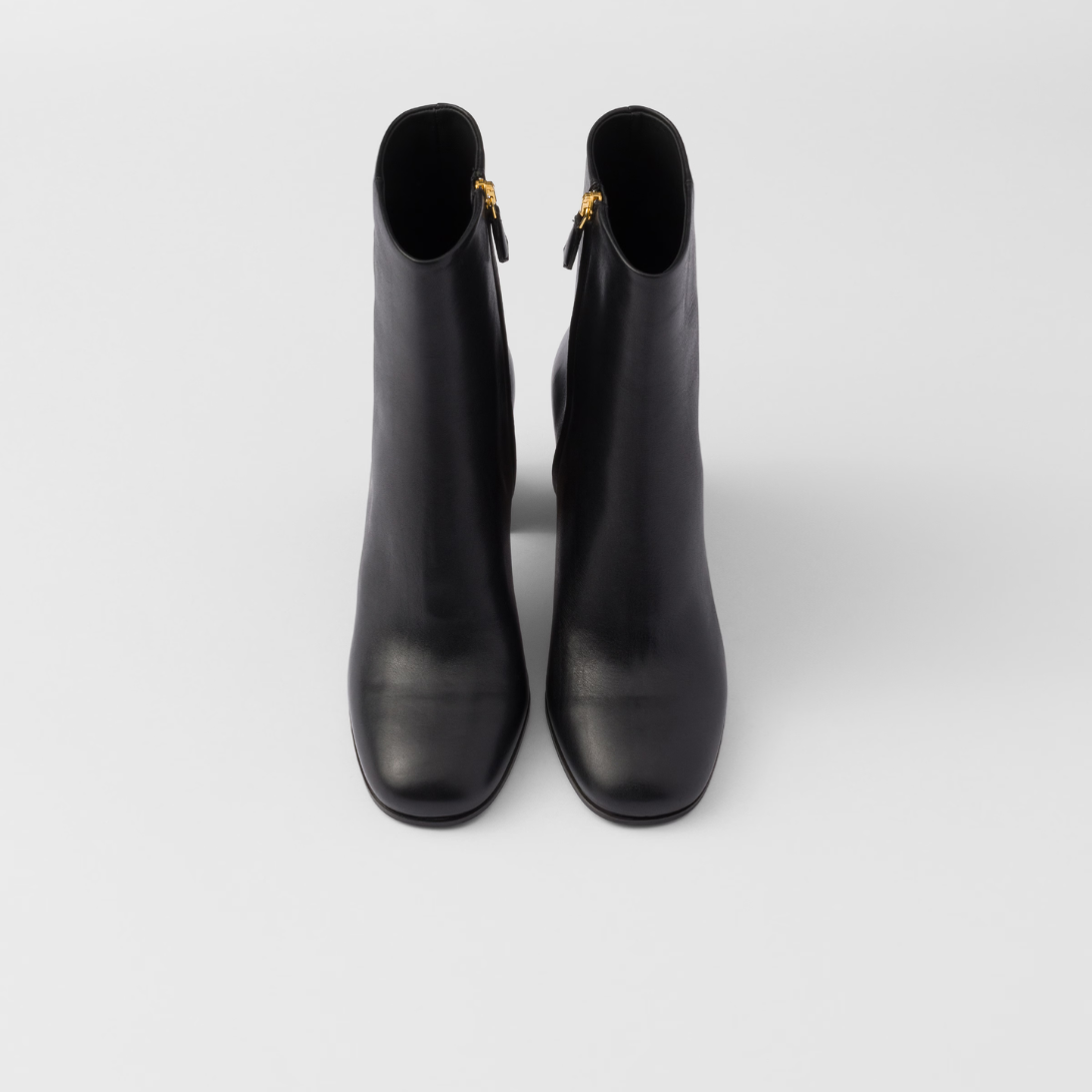 Leather booties – leather lining Side zipper closure Boot leg: 16 cm Leather and rubber sole – LUX VERSE Luxury Designer Fashion Outlet