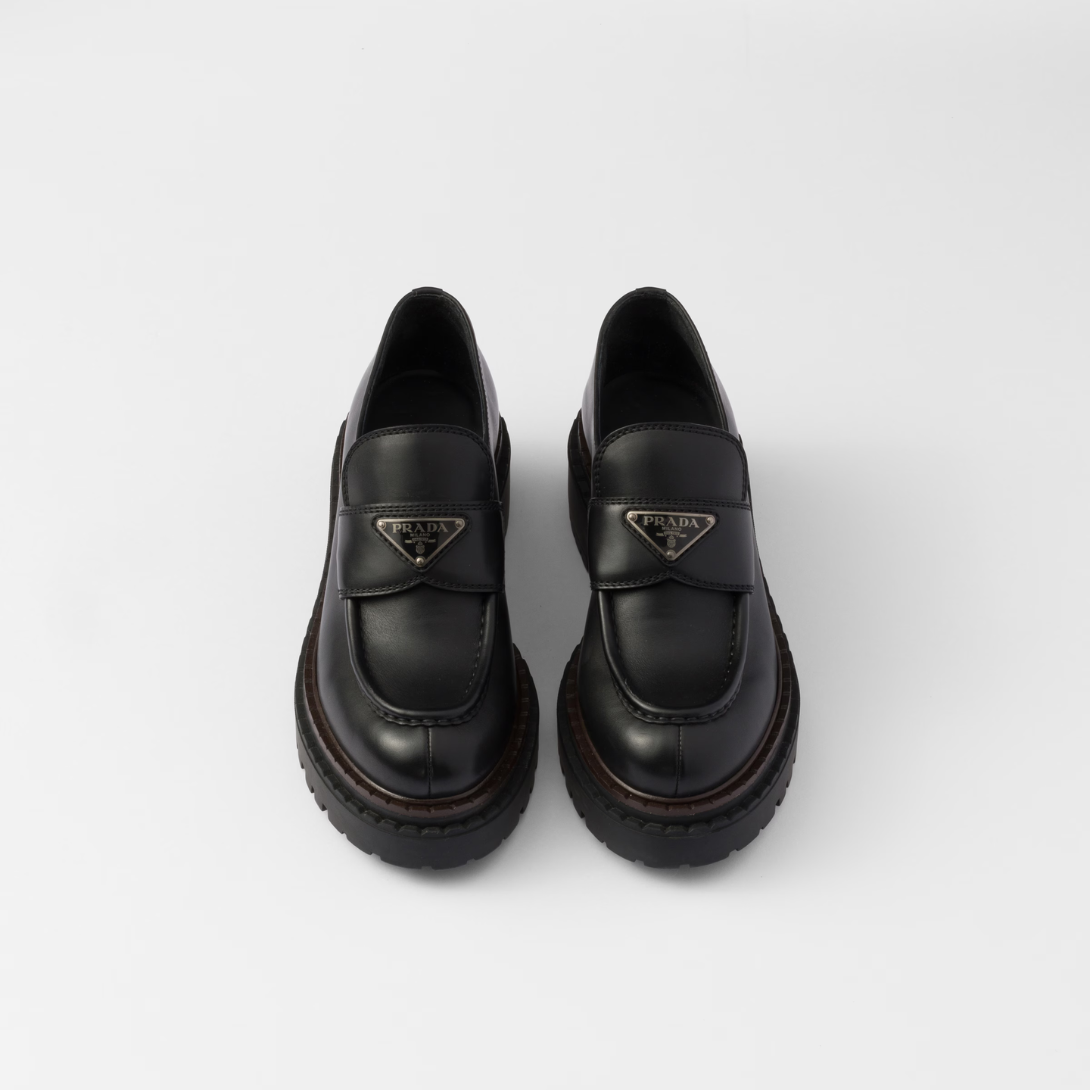 Double Chocolate leather loafers – upper with leather band Enameled metal triangle logo Monoblock rubber sole with 55 – LUX VERSE Luxury Designer Fashion Outlet