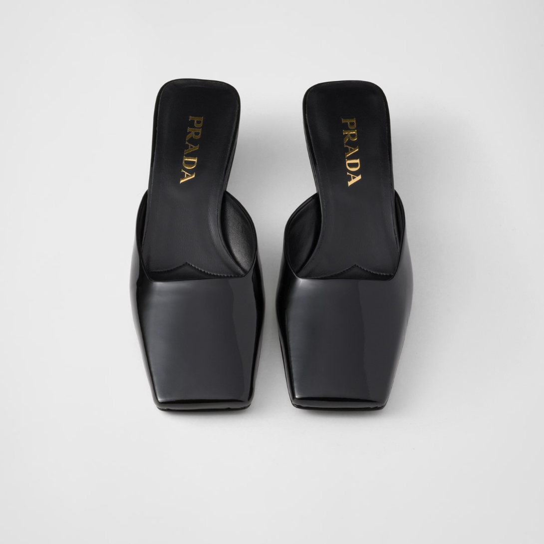 Patent leather mule – modernist lines and architectural volumes define the silhouette of these patent – LUX VERSE Luxury Designer Fashion Outlet