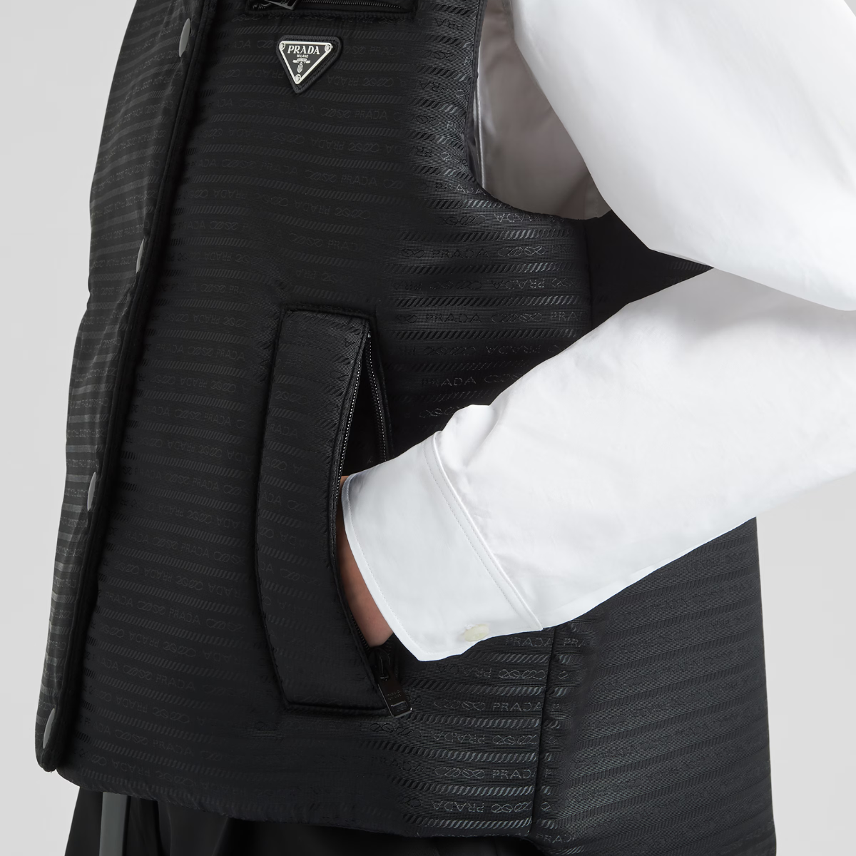 Padded Re-Nylon vest – this padded vest defined by a straight cut and minimalist attitude, with a shirt – LUX VERSE Luxury Designer Fashion Outlet