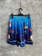Badeshorts aus Seide mit Unterwasser-Print – Herren
