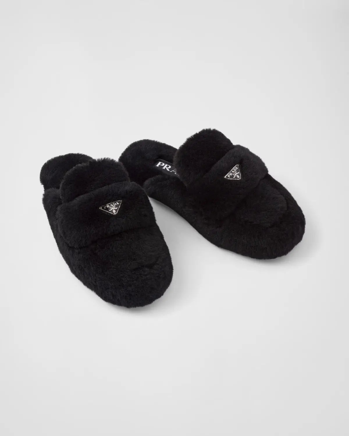 Shearling mules – these mules with a hybrid design enhance duality concept that is fundamental for the – LUX VERSE Luxury Designer Fashion Outlet