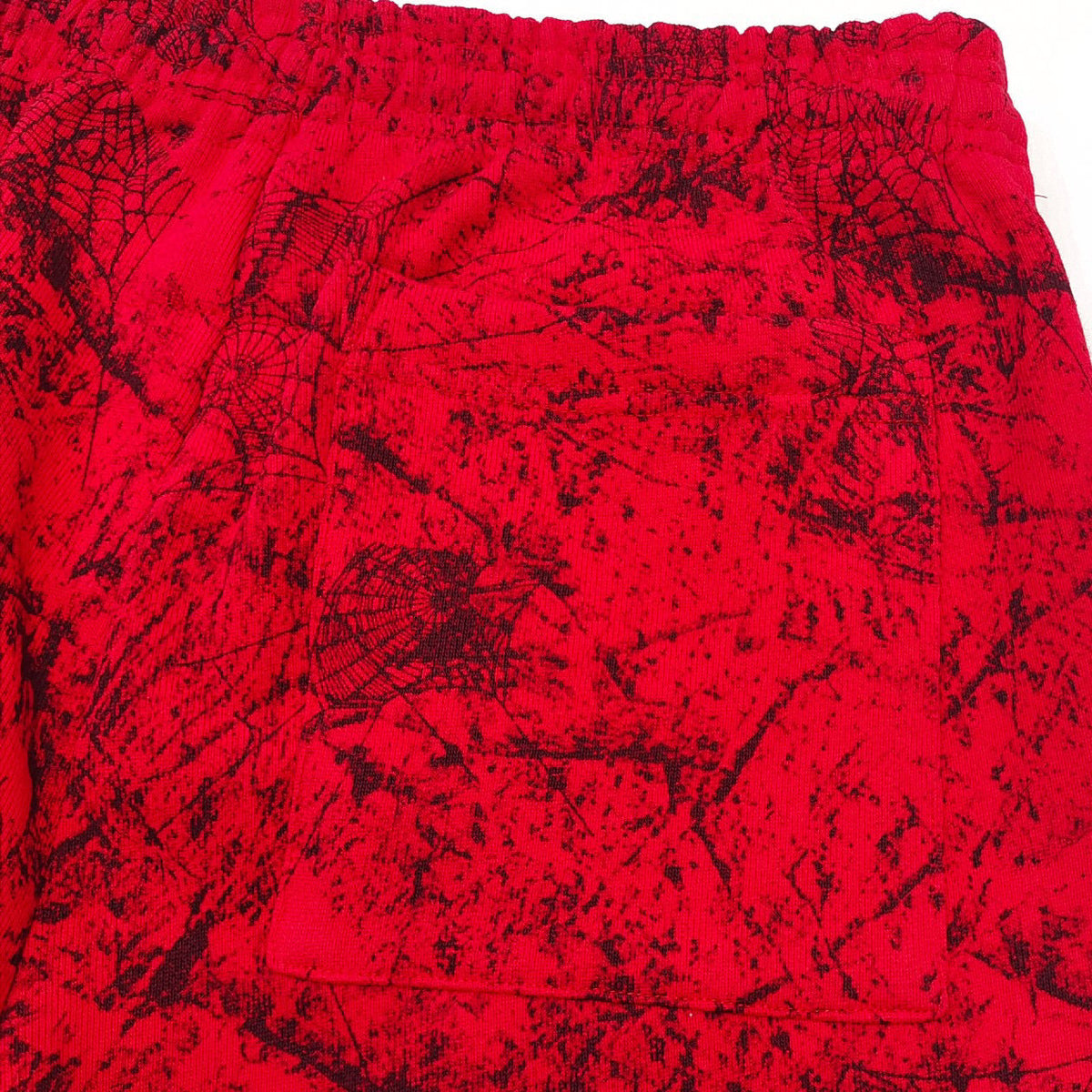 Rote Jogginghose mit Spinnenweben-Print – Herren