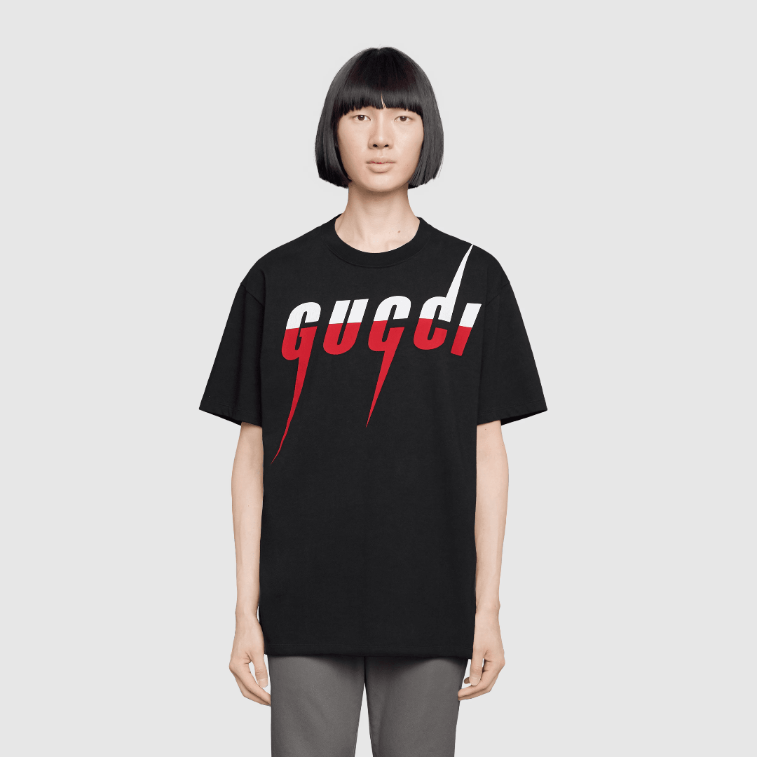Black T-SHIRT WITH BLADE PRINT – designed with an oversize fit, this piece features the white and red Blade – LUX VERSE Luxury Designer Fashion Outlet