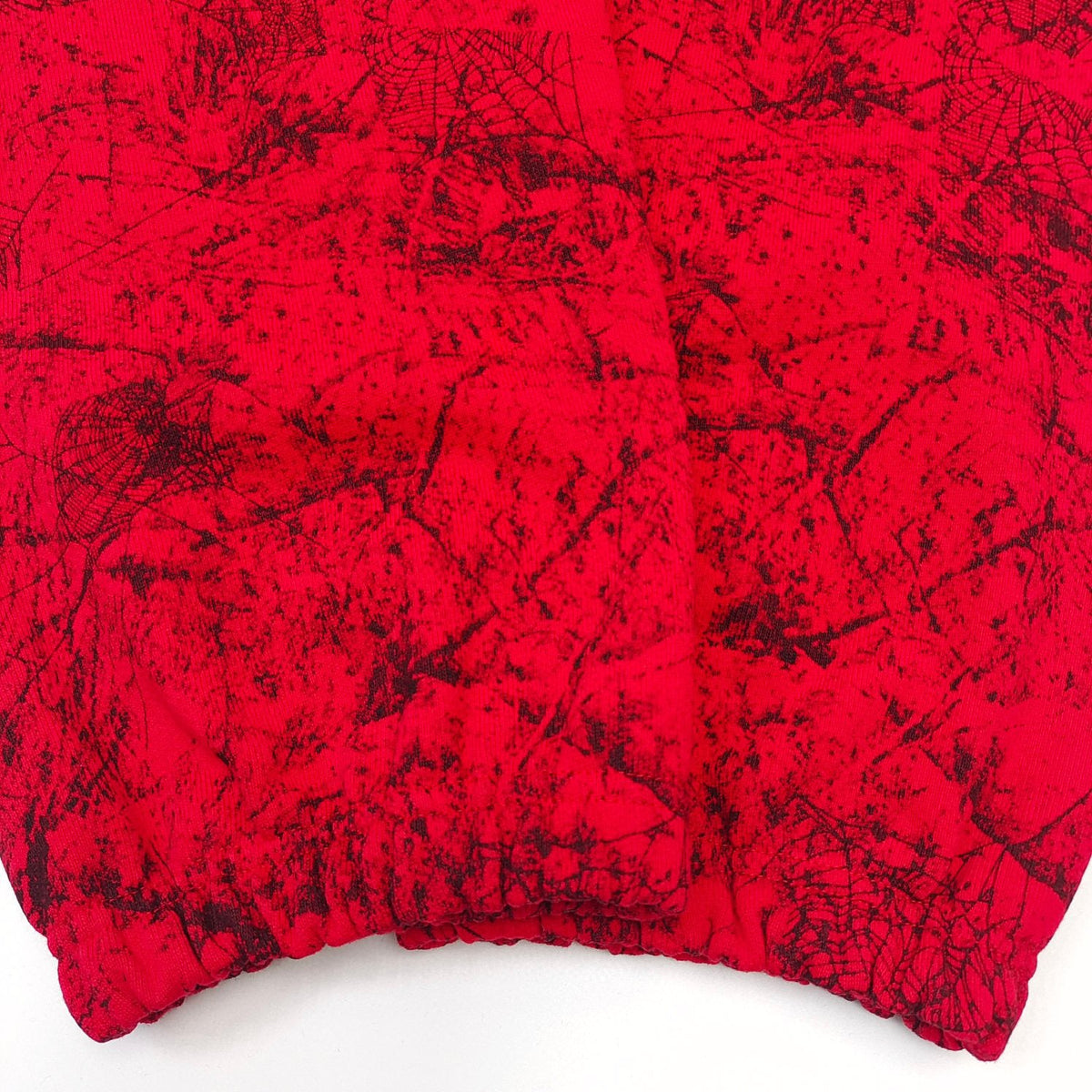 Rote Jogginghose mit Spinnenweben-Print – Herren