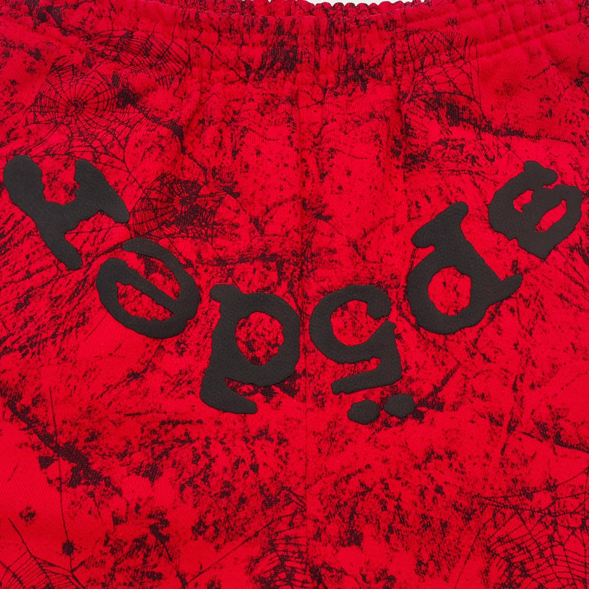 Rote Jogginghose mit Spinnenweben-Print – Herren