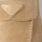 Suede Rubber Sabots – the enameled metal triangle logo embellishes the upper, while the rubber sole – LUX VERSE Luxury Designer Fashion Outlet