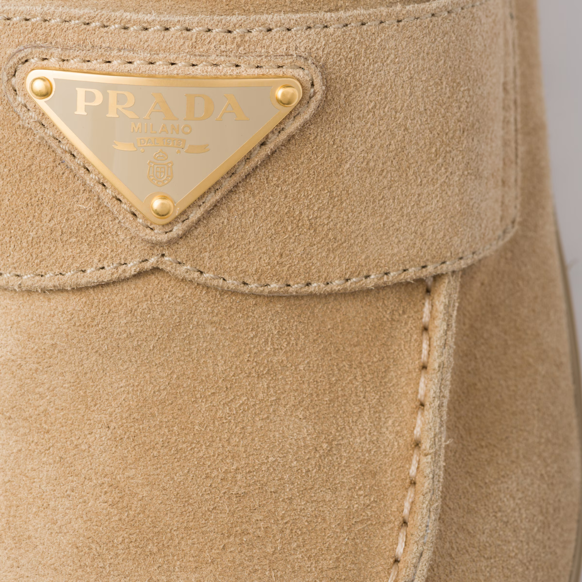 Suede Rubber Sabots – the enameled metal triangle logo embellishes the upper, while the rubber sole – LUX VERSE Luxury Designer Fashion Outlet