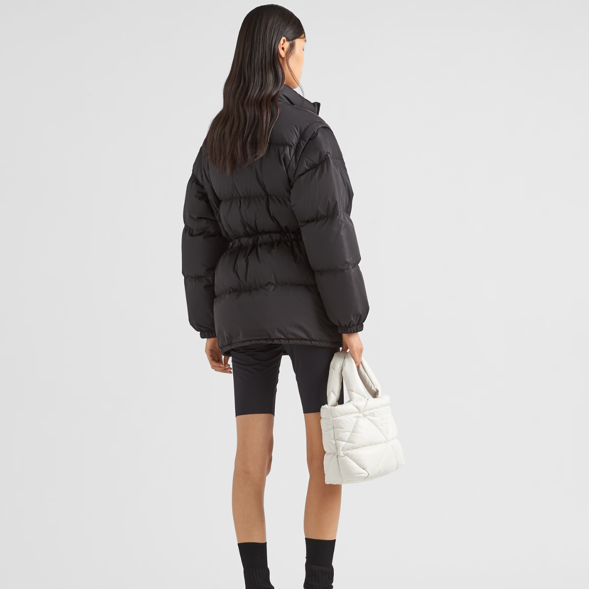 Light Re-Nylon puffer jacket – the garment with distinctive detachable sleeves is completed by the pockets – LUX VERSE Luxury Designer Fashion Outlet