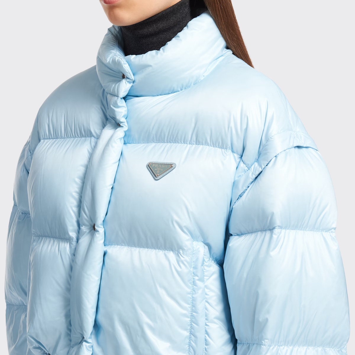 Re-Nylon cropped convertible down jacket – padded with goose down, the garment is decorated with the iconic enameled metal – LUX VERSE Luxury Designer Fashion Outlet