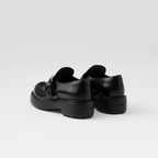 Elegant Brushed leather loafers – the refined footwear is completed with archive-inspired, oversized buckles – LUX VERSE Luxury Designer Fashion Outlet