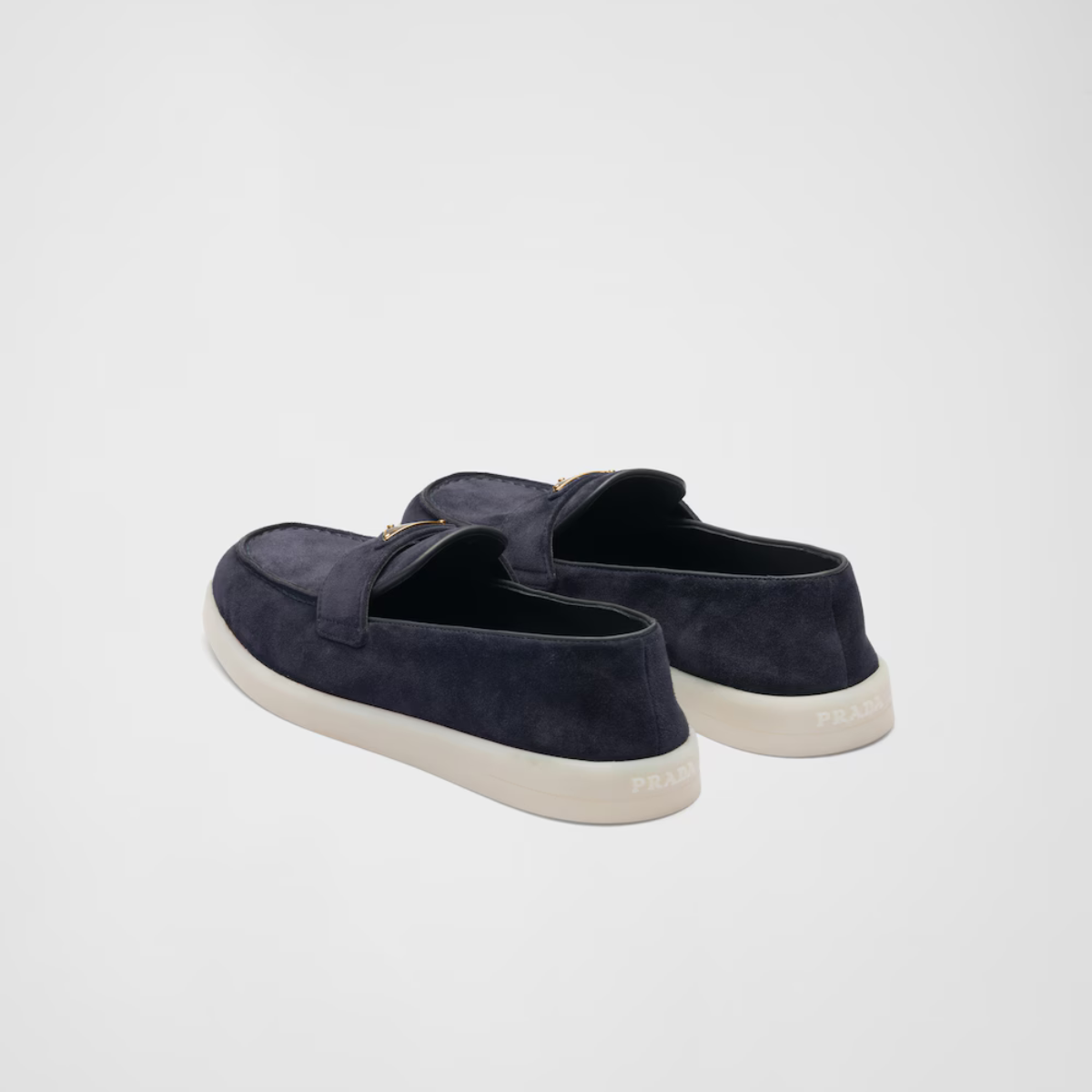 Suede leather loafers – the enameled metal triangle logo embellishes the band, while the rubber sole adds – LUX VERSE Luxury Designer Fashion Outlet