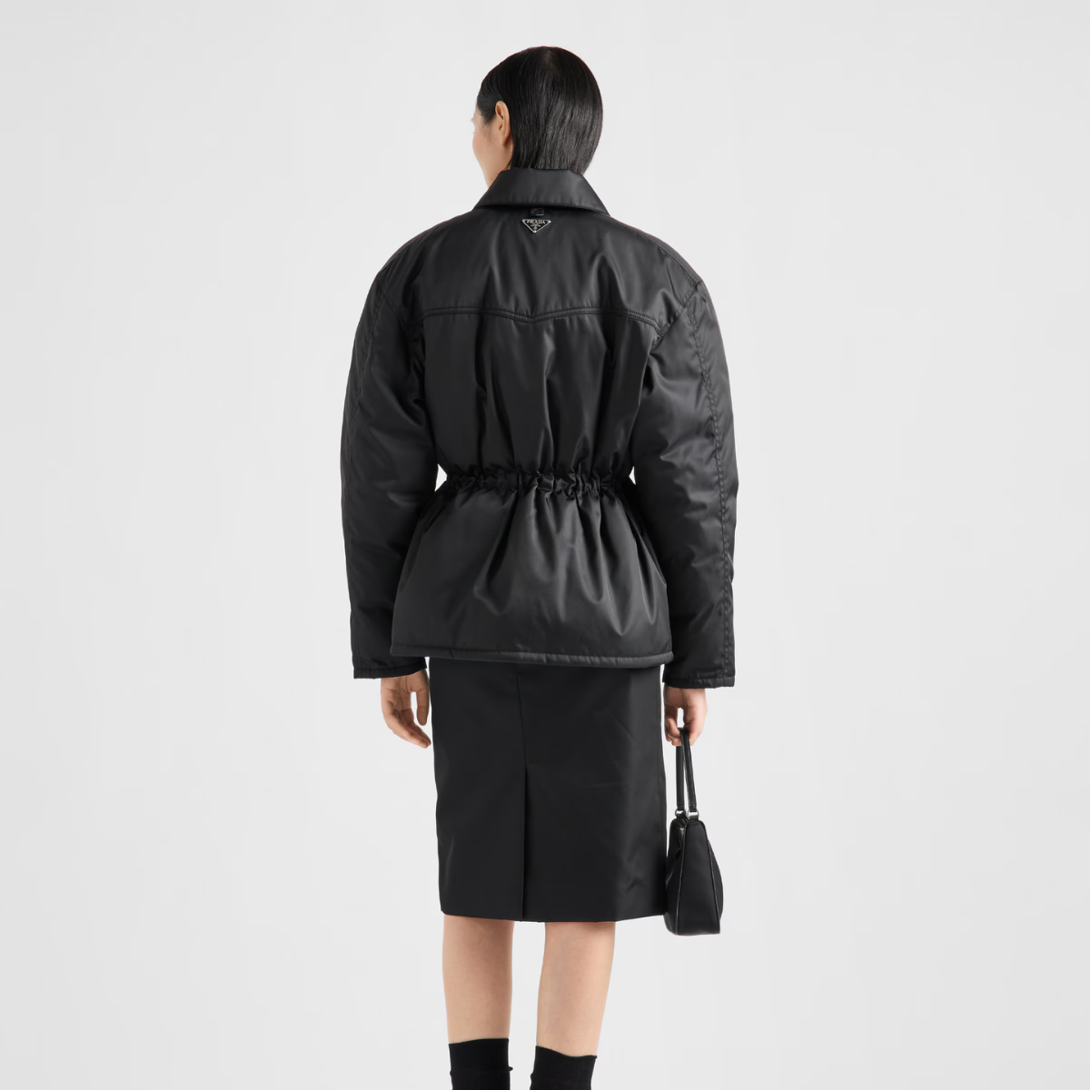 Re-Nylon down fashion jacket – soft, enveloping volumes create the silhouette of this Re-Nylon down jacket, – LUX VERSE Luxury Designer Fashion Outlet