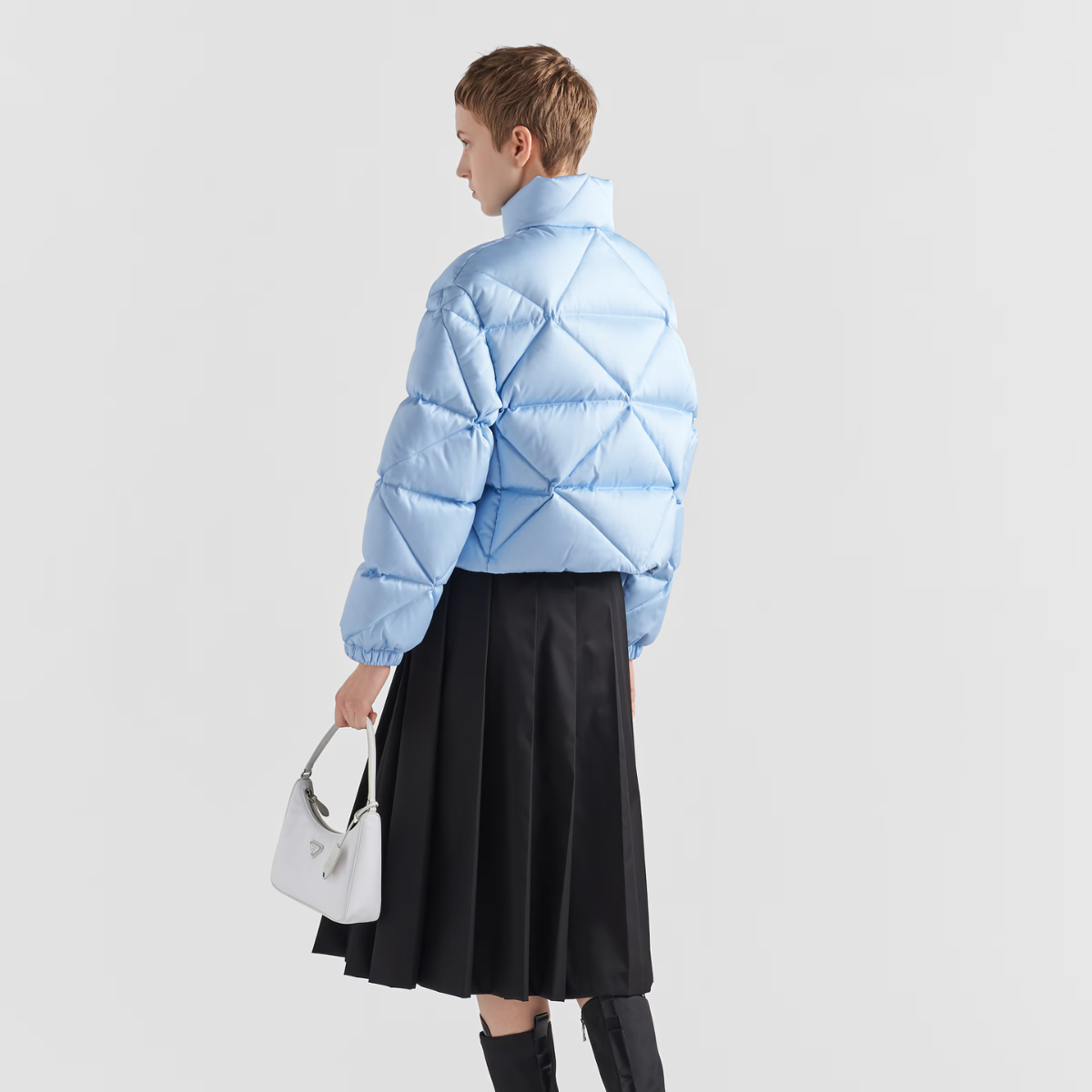 Re-Nylon Gabardine cropped down jacket – the lettering logo is framed by the iconic triangle that is interpreted – LUX VERSE Luxury Designer Fashion Outlet