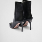 Nappa leather booties – the iconic metal lettering logo embellishes the leather sole – LUX VERSE Luxury Designer Fashion Outlet