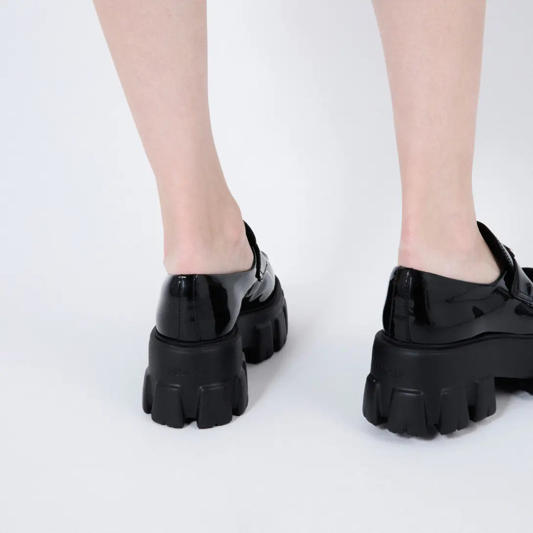 Monolith patent leather loafers – upper with leather band and metal triangle logo Apron with stitched raised edge – LUX VERSE Luxury Designer Fashion Outlet