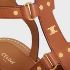 LYMPIA GLADIATOR SANDAL in CALFSKIN – sHAPEMETAL TRIOMPHE ON THE UPPERLITTLE STUDS ALL OVER THE UPPERENGRAVED – LUX VERSE Luxury Designer Fashion Outlet